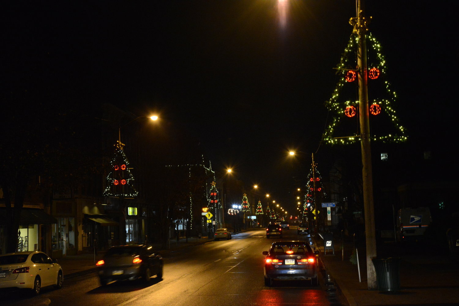 For years, these trees have lit  the way of Main Street motorists and pedestrians in the holiday season.